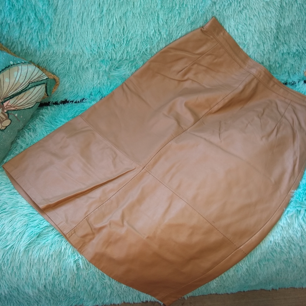 Genuine Leather pencil skirt. Size 9/10 w/ kick pleat in back. Taupe